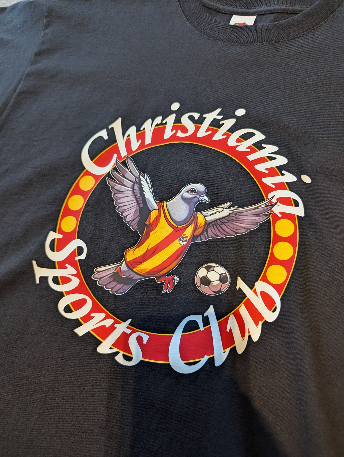 CSC Tee, Dove badge